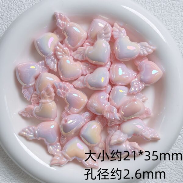 oly-86ad107fb94cf12feb2f29e807565d1b Wholesale UV Plated Acrylic Glow in the Dark Heart Wing Beads for DIY Phone Charm Keychain Craft Supplies Resale