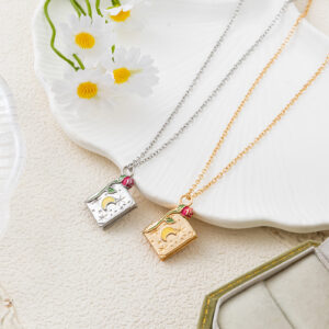 oly-8ac7055098f98d06a7bacb5b5260d81e Wholesale Vintage Star Moon Book Pendant Necklace Electroplating Copper Copper Openable Locket Silver Boutique Resale