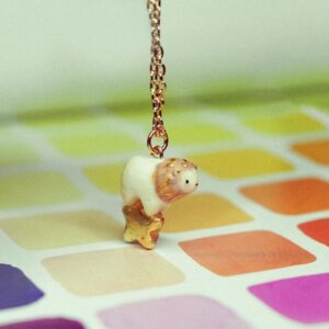 Sloth stepping on stars necklace