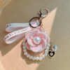Wholesale Trendy Metal Camellia Keychain Bag Charm With Pearl Elements Black Color Fashion Accessory For Gift Boutique Resale