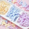 oly-8edcb0622fa8959953702ad65934599e Wholesale Flocked Acrylic Bow Tie Beads Cream Yellow - DIY Loose Beads for Jewelry Making, Phone Charm, Party Gift Accessories
