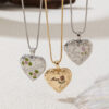 oly-8fab2cf9fb4dc3203e0827684790fb19 Wholesale Vintage Heart Locket Necklace Stainless Steel Engraved Floral Design Chic Gift For Everyday Wear