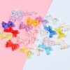 oly-923e9c48ffecefb30edd855db95d2f36 Wholesale Trendy Iridescent Bow Tie Beads DIY Craft Supplies for Jewelry Making and Hair Accessories