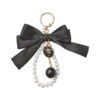 oly-929657f8e633414bd8be10d4fea70176 Wholesale Large Bow Pearl Chain Keychain For Women Car Key Accessory Handbag Charm Boutique Resale
