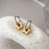 oly-93dd957429d5d883f1441c6970883a8b Wholesale Titanium Steel Electroplated Lucky Star Earrings French Contrast Color Oval Ear Cuffs Fashion Jewelry For Women