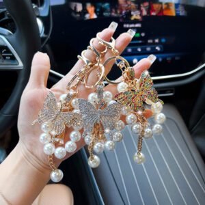Wholesale Butterfly Pearl Keychain Gold Alloy Women S Fashion Accessory For Car And Bag Boutique Resale