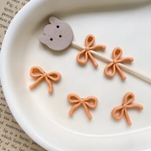 05-orange / Size is about 12*16mm, hole diameter is about 2.4mm