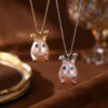 oly-a3d1b36240b34b395d8b2c37ff08d7cd Wholesale Pink Rabbit Pearl Cherry Blossom Pendant Necklace Cute Animal Design Electroplated Copper Fashion Jewelry Gift For Women