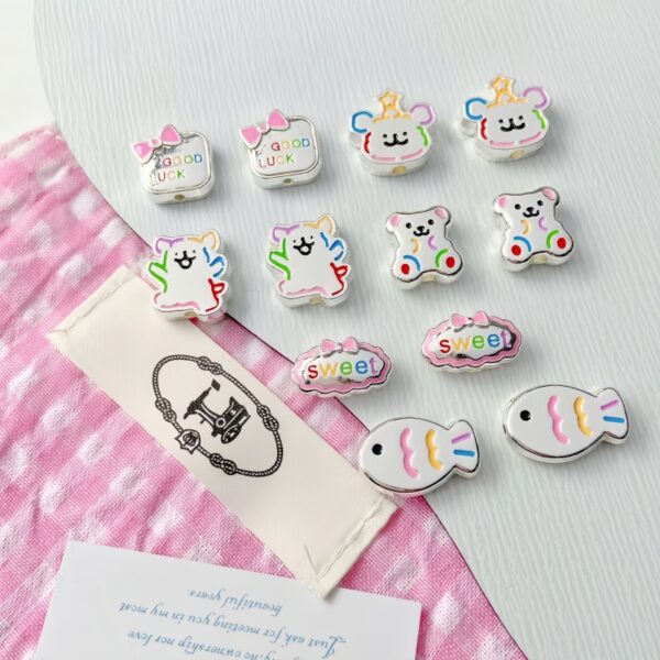 oly-a8b344eec8b1f15c1a0bca281634b0af Wholesale Cute Puppy Fish Bowknot Alloy Beads for DIY Phone Chain and Bracelet Making Fashion Accessory