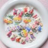 oly-abc9101826046e15b22b417ed6836c61 Wholesale Multicolor UV Coated Cartoon Resin Loose Beads for DIY Phone Chain Keychain Jewelry Making
