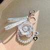 Wholesale Trendy Metal Camellia Keychain Bag Charm With Pearl Elements Black Color Fashion Accessory For Gift Boutique Resale