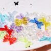 oly-af66e9b392b629c662a4776de1d5686d Wholesale Trendy Iridescent Bow Tie Beads DIY Craft Supplies for Jewelry Making and Hair Accessories