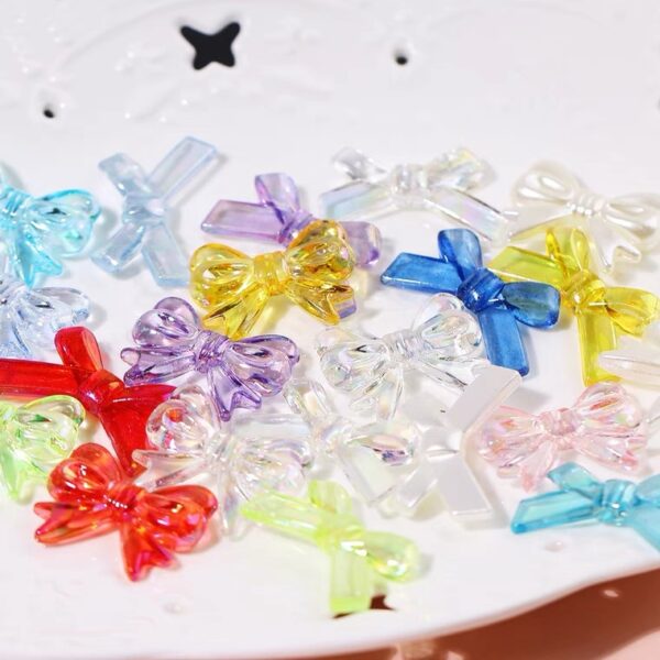 oly-af66e9b392b629c662a4776de1d5686d Wholesale Trendy Iridescent Bow Tie Beads DIY Craft Supplies for Jewelry Making and Hair Accessories