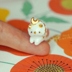 Moon on head white animal necklace