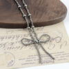 oly-b22e3bea03451abe3e681c96a4606d6e Wholesale Bronze Electroplated Zinc Alloy Beaded Bow Choker Necklace Retro Denim Style Fashion Accessory