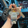 oly-b617cc0bd5df695d9b30c45f33fdc44d Wholesale Metal White AB Rhinestone Crown Bear Car Keychain With Number Plate Couple Gift