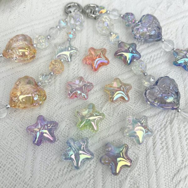 oly-b73c28ee92ce3dcaae50ea5d61c39184 Wholesale Five-Pointed Star UV Coated Transparent Acrylic Beads for DIY Phone Charm Keychain Boutique Resale