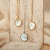 oly-b74f71e2dd3b6fd2da9ae7648c16ab0b Wholesale Pet Memorial Photo Locket Necklace Titanium Steel Electroplated Round Pendant Mother Of Pearl Jewelry Accessory For Dog Cat Lovers Gift