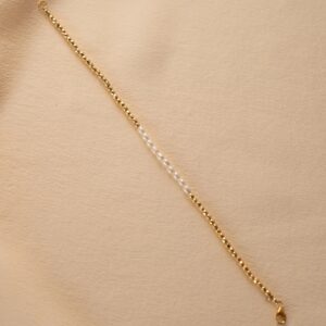 Golden beads and beige beads bracelet