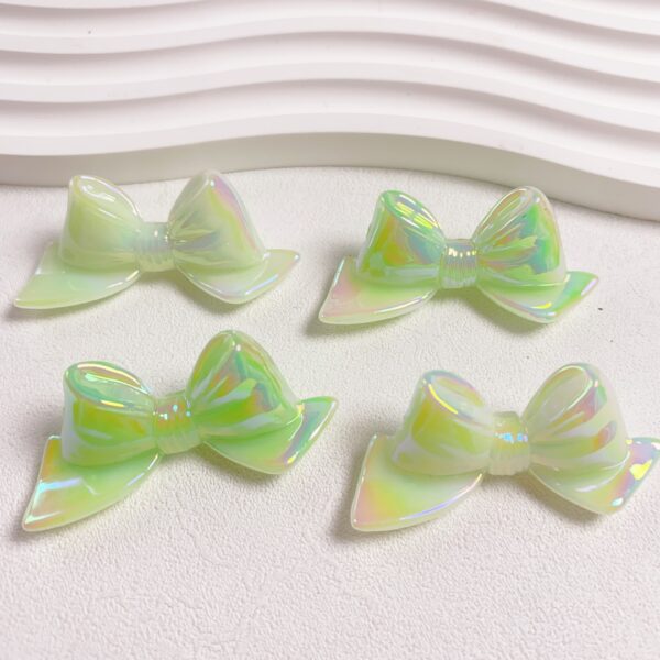 oly-bb4fff3cfa63a69b5245001c25458740 Wholesale Starry Glow 3D Bow Acrylic Beads Electroplated DIY Phone Charm Keychain Jewelry Accessory Gift