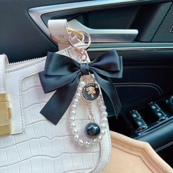 oly-c1f481d5664f0c5e6a9514b12e7c6a0e Wholesale Large Bow Pearl Chain Keychain For Women Car Key Accessory Handbag Charm Boutique Resale