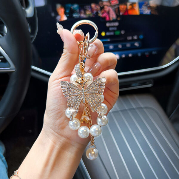 oly-c8202d6ed08d4f627fe37d34da6b907b Wholesale Butterfly Pearl Keychain Gold Alloy Women S Fashion Accessory For Car And Bag Boutique Resale