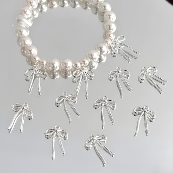oly-c87b496abeab61b4e5f2f02c80acf14b Wholesale Chic Silver Alloy Bow Loose Beads, Color-Plated DIY Jewelry Craft Supply for Bracelet Necklace Making, Boutique Resale