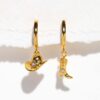 oly-d8edf546743ad2a7978aea16078bbde6 Wholesale Stylish Cowboy Boot And Hat Pendant Earrings Silver Electroplated Copper Trendy Jewelry Accessory Boutique Resale