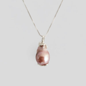 Silver necklace with pink halo-shaped pearls