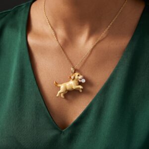 Running Golden Retriever Holding a Round Zirconia Necklace