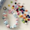 oly-e3b10b2e873c62a0a3ae62bb63f8ea7a Wholesale Light Pink Acrylic Star Loose Beads Shiny Baked Enamel Finish DIY Jewelry Making Supplies Fashion Accessory
