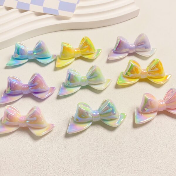 oly-e57a95dbd241fb24b90c1ce175b689ee Wholesale Starry Glow 3D Bow Acrylic Beads Electroplated DIY Phone Charm Keychain Jewelry Accessory Gift