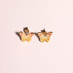 A pair of small powder-transparent earrings