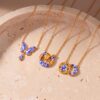 oly-f15b842e18d4e9f500b11f0aff6590cb Wholesale Stylish Stainless Steel Blue Porcelain Star Moon Drop Pendant Necklace Electroplated Finish Boutique Resale Jewelry Accessory