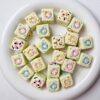 oly-f33b10a563e2ecebd4cd6ee07b9eedc5 Wholesale HandPainted Acrylic Macaron Donut Beads Square Straight Hole Loose Beads for DIY Jewelry Making Trendy Fashion Accessory