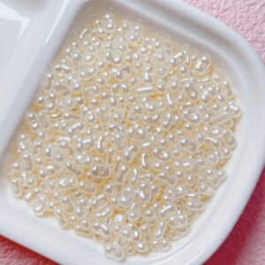 E29-06-Beige / The size is about 4*6.5mm, the aperture is about 1.2mm