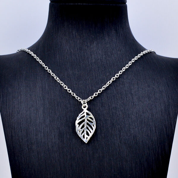 oly-f9e735dc9ab635b50c39fd658884b606 Wholesale Plated Zinc Alloy Leaf Pendant Earrings And Necklace Set Korean Minimalist Hollow Out Style Fashion Jewelry For Women