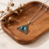 oly-fa64c1b63537dbd39648d9825bc67017 Wholesale Hip Hop Blue Eye Triangle Pendant Necklace Stylish Streetwear Jewelry Accessory Zinc Alloy Silver Finish Boutique Resale Gift