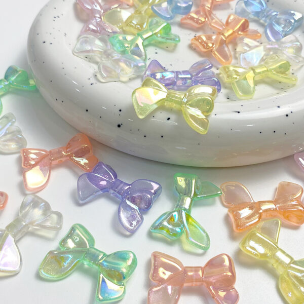 oly-fb1249e2bac8a0fd4748fd13b76bcf90 Wholesale Acrylic Loose Beads UV Glow Glitter Bow Mermaid Iridescent DIY Jewelry Making Phone Charm Accessory